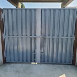 iron dumpster gate